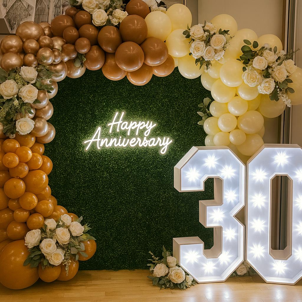 Anniversary party balloon display with elegant decor